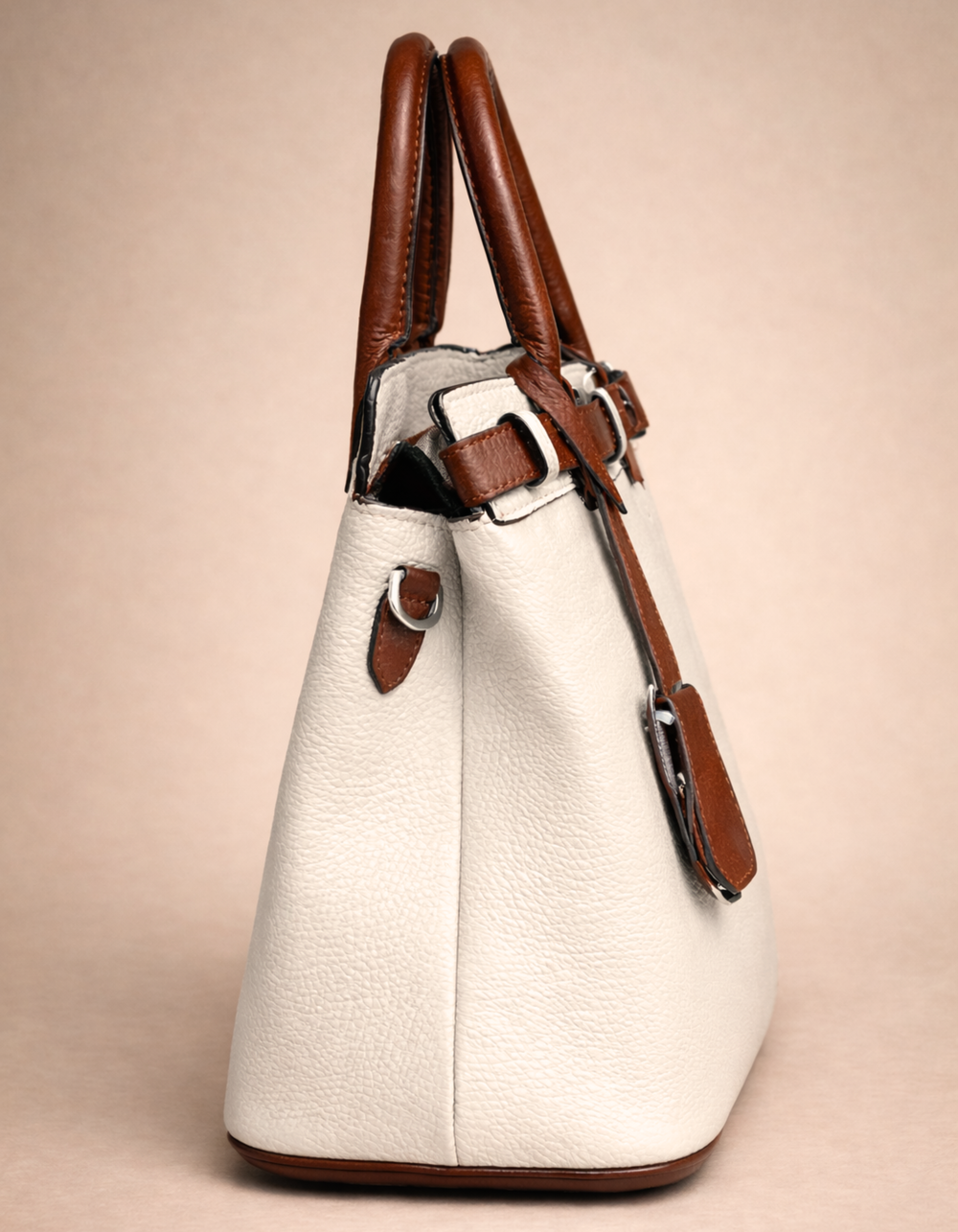 white and brown handbag