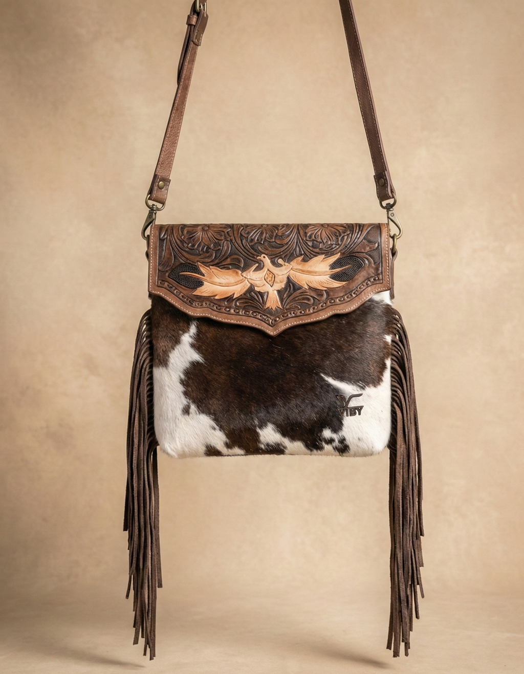 Women’s Cowhide Leather Crossbody Bag with Fringe Detailing