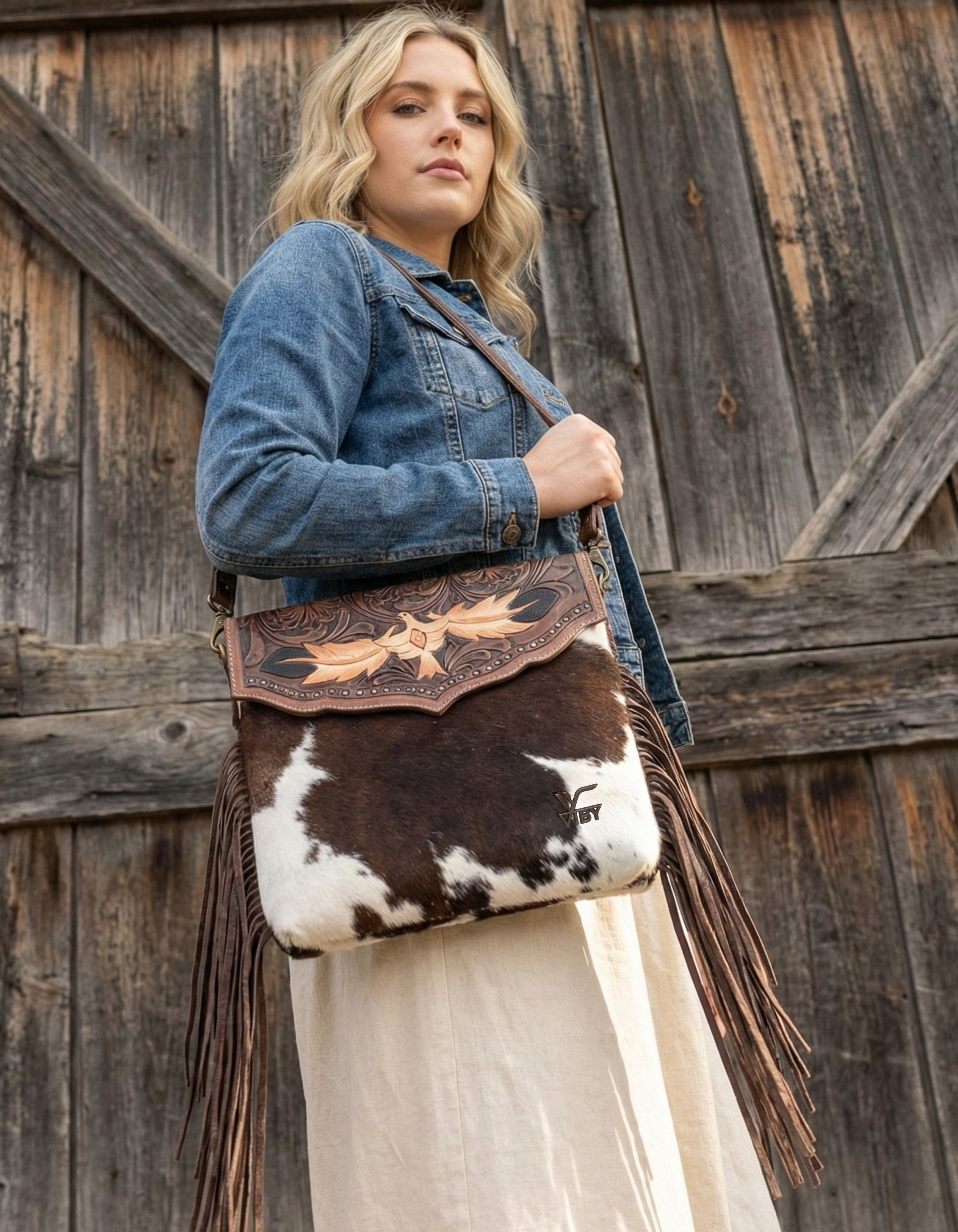 Women’s Cowhide Leather Crossbody Bag with Fringe Detailing