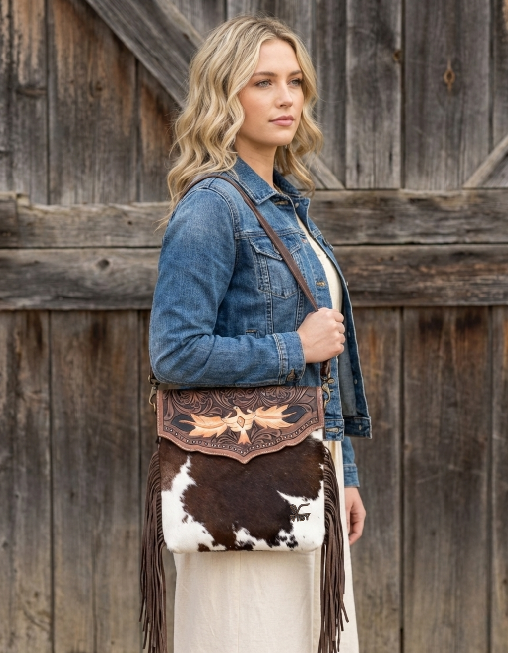 Women’s Cowhide Leather Crossbody Bag with Fringe Detailing