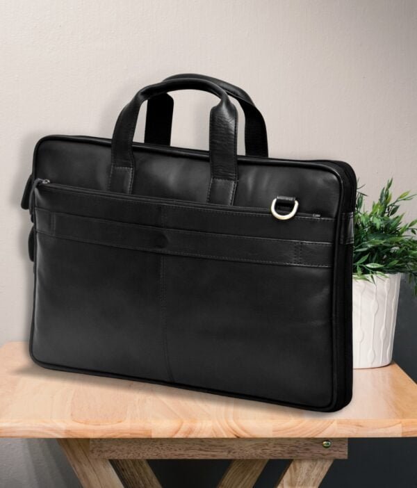 Side view of black leather laptop bag.