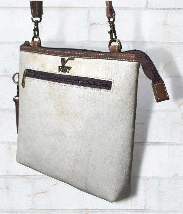 Side view of Haironn leather ladies purse showcasing its sleek design.